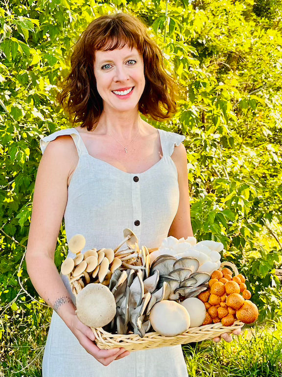 Rishona holding a basket of mushrooms
